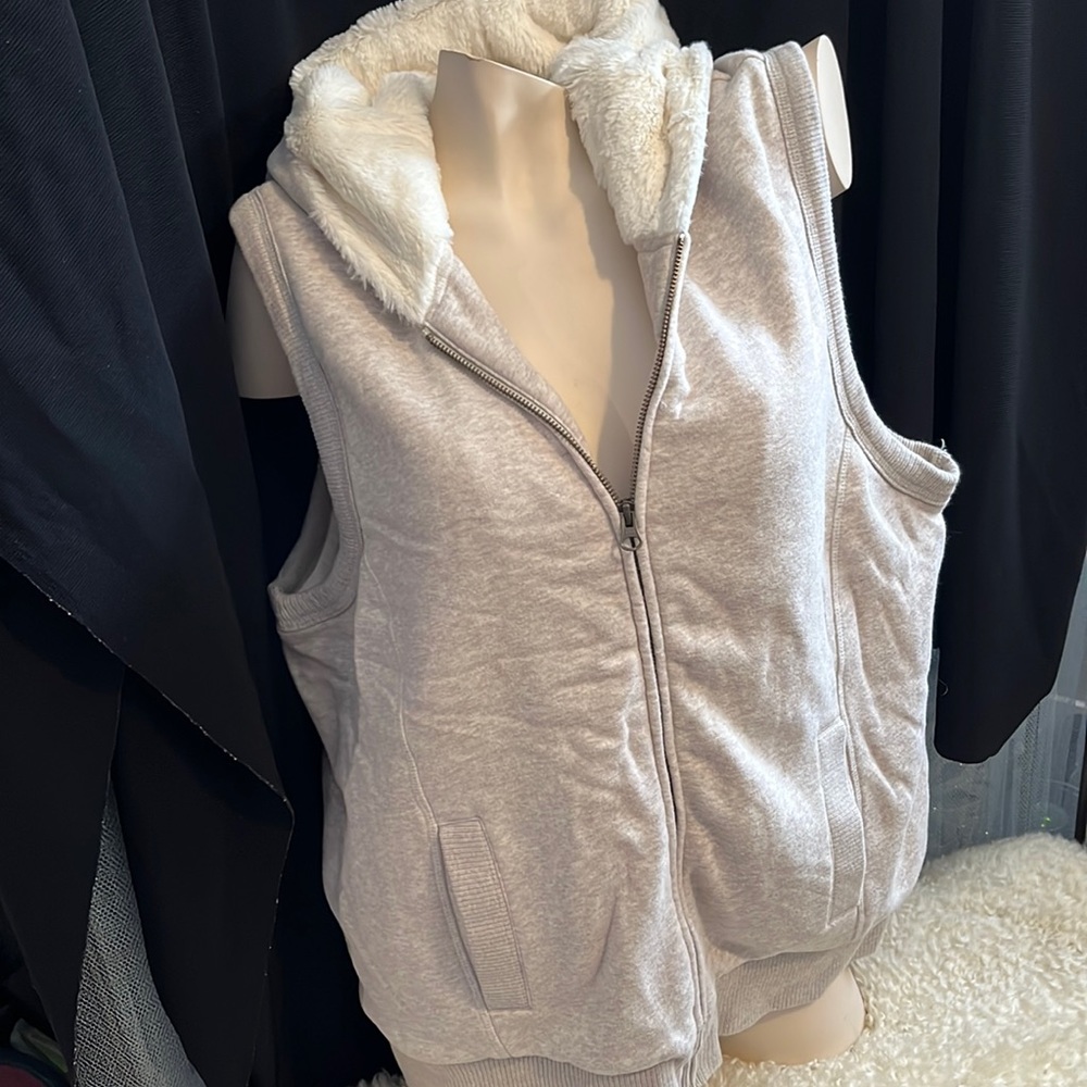 Vest with hood